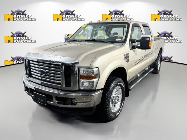 Gold 2010 Ford F-350 Super Duty Lariat Crew Cab 4WD Pickup Truck Four-Wheel Drive 6-Speed Manual Overdrive