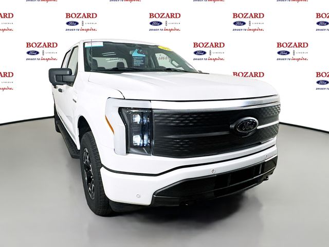 2023 Oxford White Ford F-150 Lightning XLT AWD Truck