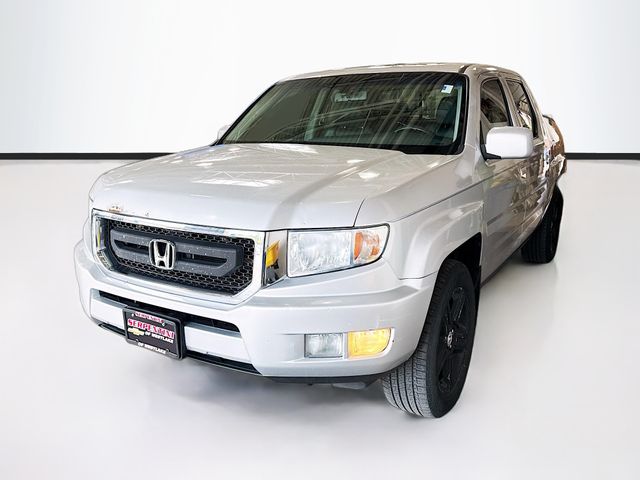 Silver 2009 Honda Ridgeline RTL Pickup Truck Four-Wheel Drive 5-Speed Automatic