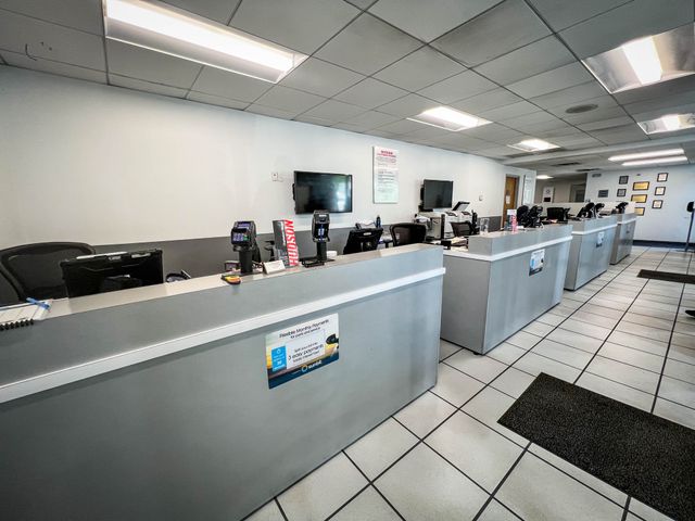 2025 Aspen White Tricoat Nissan Versa 1.6 SV FWD Sedan