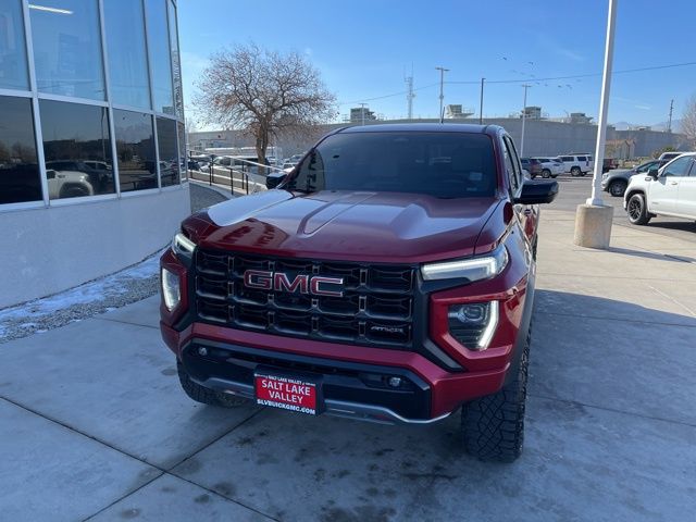 Volcanic Red Tintcoat 2024 GMC Canyon AT4X Crew Cab 4WD Pickup Truck Four-Wheel Drive 8-Speed Automatic