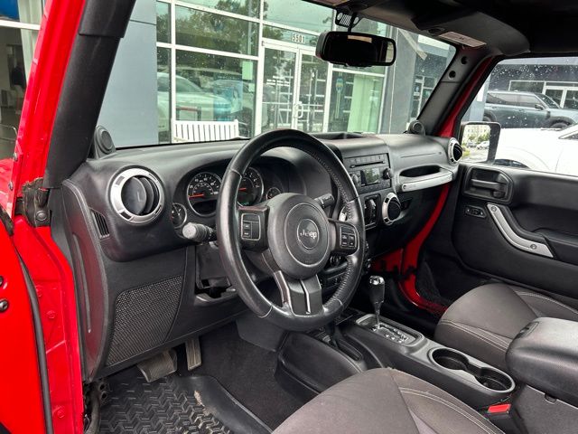 Used 2014 Red Jeep Unlimited Sahara image 21
