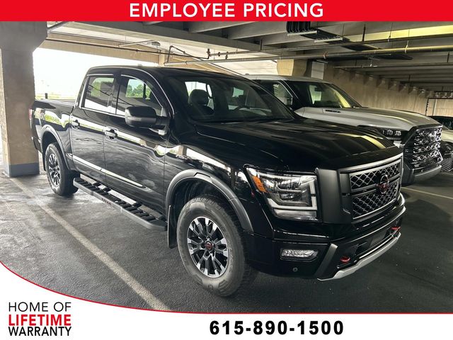 Super Black 2023 Nissan Titan Pickup Truck Four-Wheel Drive 9-Speed Automatic