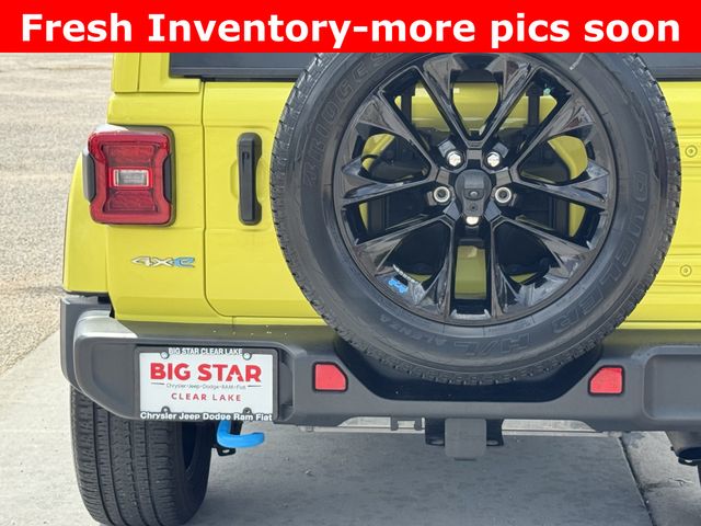 2023 Jeep Wrangler Sahara 4xe Yellow at DeMontrond Gulf Freeway