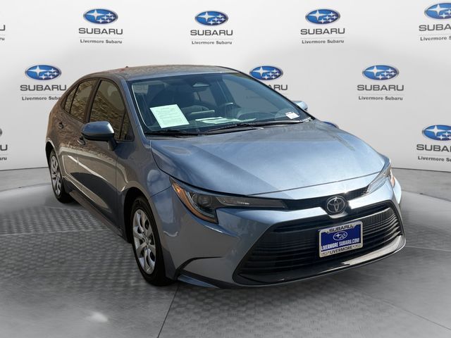 Blueprint/Midnight Black Metallic 2024 Toyota Corolla LE FWD Sedan Front-Wheel Drive Continuously Variable Transmission