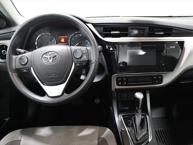 Used 2017 Classic Silver Metallic Toyota LE image 12