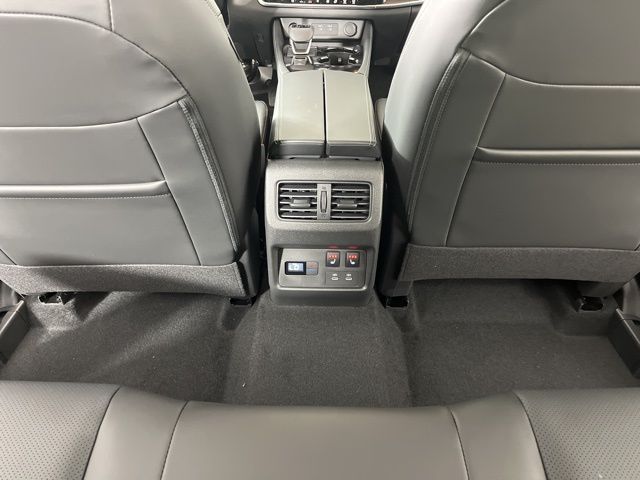 2025 Champagne Silver Metallic/Super Black Nissan Rogue Platinum FWD SUV