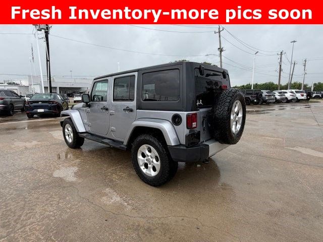 2013 Jeep Wrangler Unlimited Sahara Silver at DeMontrond Auto Country