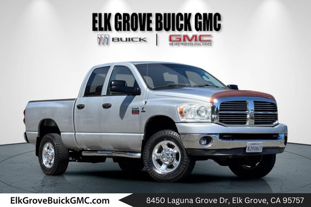 Bright Silver Metallic CC/Mineral Gray Met CC 2009 Dodge RAM 2500 SLT Quad Cab 4WD Pickup Truck Four-Wheel Drive 6-Speed Automatic