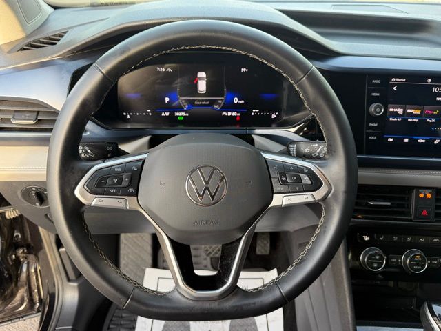 used 2024 Volkswagen Taos car, priced at $23,220