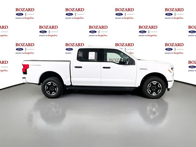 2023 Oxford White Ford F-150 Lightning XLT AWD Truck