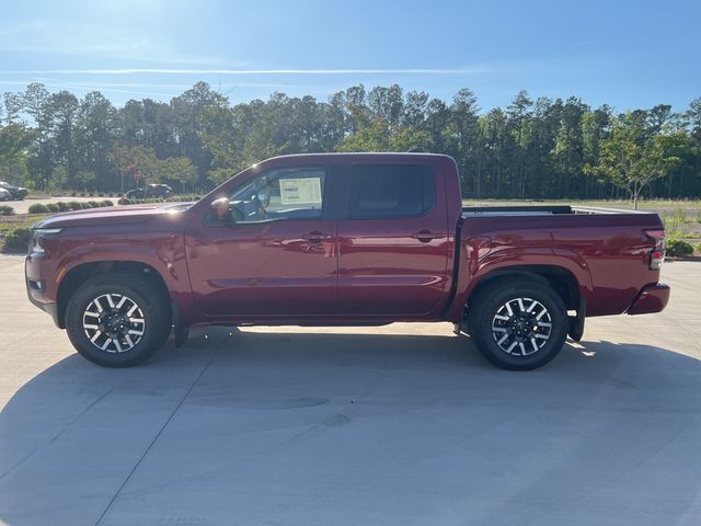 2025 Cardinal Red Metallic Tricoat Nissan Frontier SL RWD Truck
