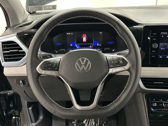 2025 Volkswagen Taos 1.5T SE Black at Subaru and VW of Moon Township