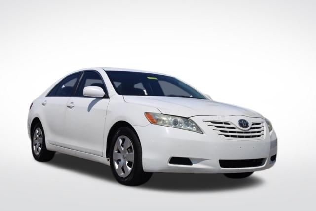 Super White 2009 Toyota Camry LE Sedan Front-Wheel Drive 5-Speed Automatic Overdrive