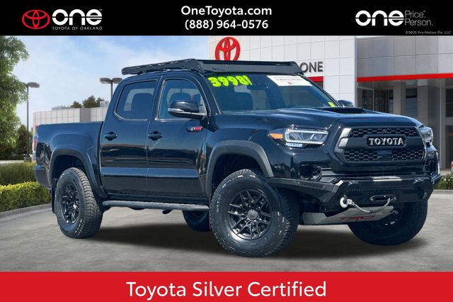 Midnight Black Metallic 2021 Toyota Tacoma Pickup Truck Four-Wheel Drive 6-Speed Automatic