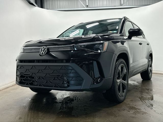 2026 Volkswagen Taos 1.5T SE Black Black at Subaru and VW of Moon Township