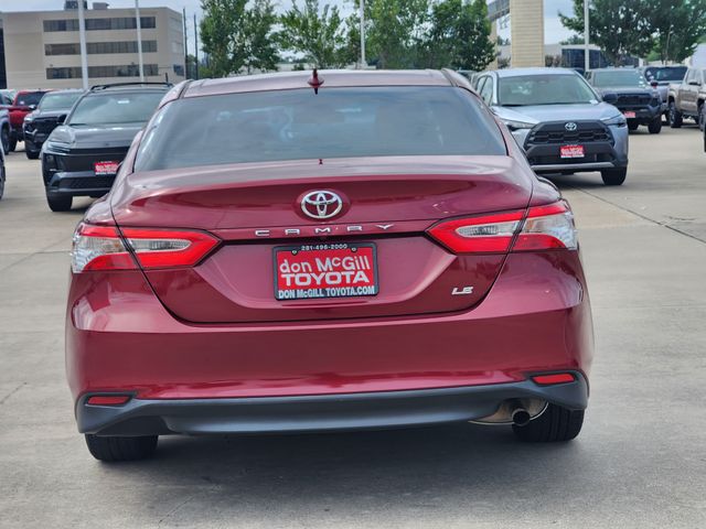 2020 Toyota Camry LE Red at Monument Chevrolet