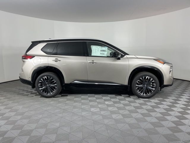 2025 Champagne Silver Metallic/Super Black Nissan Rogue Platinum FWD SUV