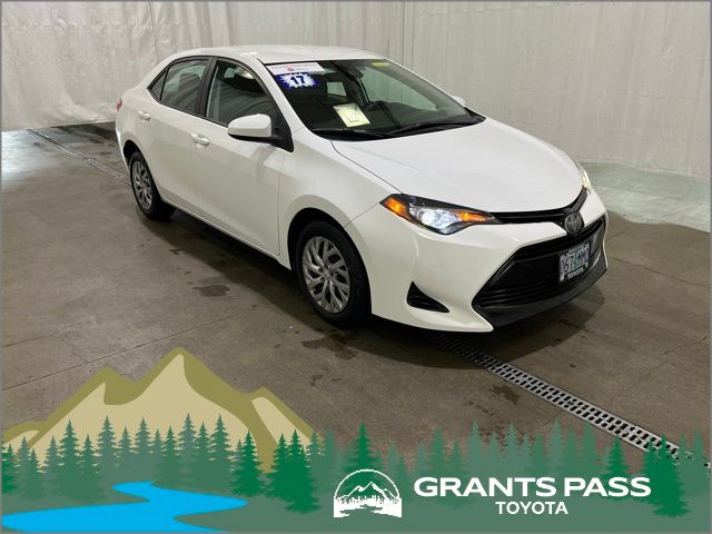 White 2017 Toyota Corolla LE Sedan Front-Wheel Drive Continuously Variable Transmission