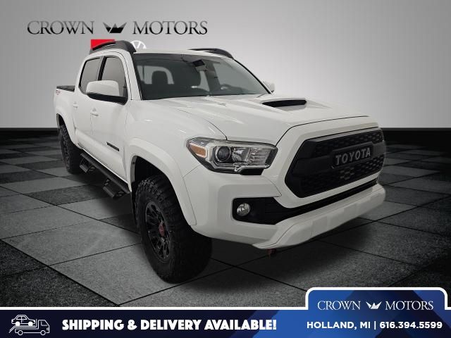 Super White 2019 Toyota Tacoma TRD Sport Double Cab 4WD Pickup Truck Four-Wheel Drive 6-Speed Manual