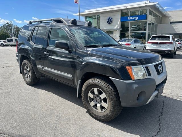 Super Black Metallic 2011 Nissan Xterra SUV / Crossover  5-Speed Automatic