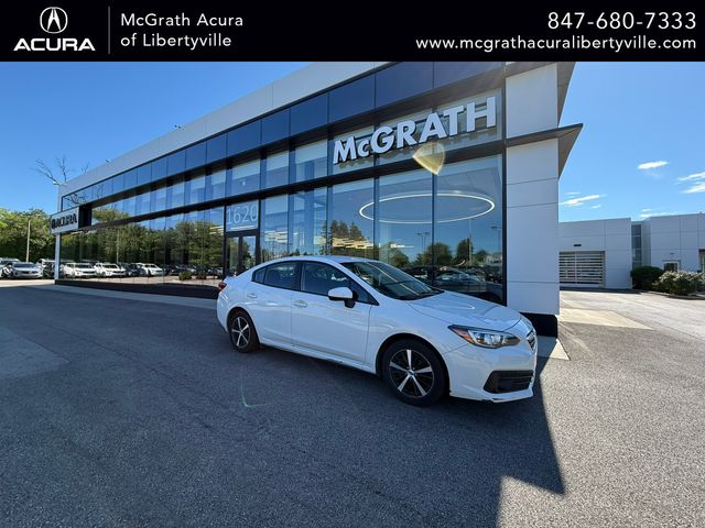 Crystal White Pearl 2023 Subaru Impreza Sedan All-Wheel Drive Continuously Variable Transmission
