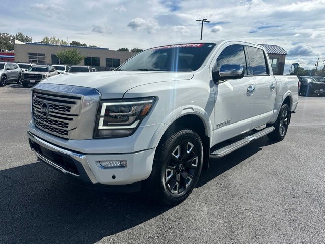 Pearl White 2024 Nissan Titan Pickup Truck Four-Wheel Drive 9-Speed Automatic