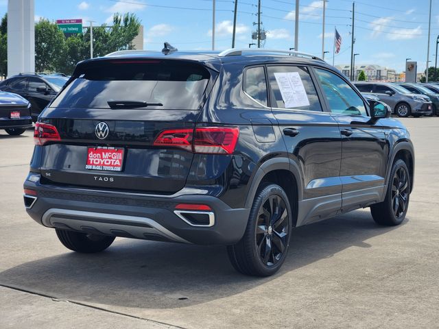 2023 Volkswagen Taos 1.5T SE Black at DeMontrond Auto Country
