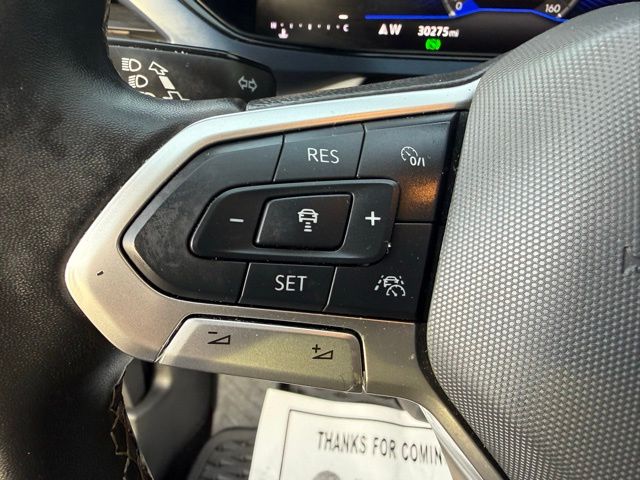 used 2024 Volkswagen Taos car, priced at $23,220