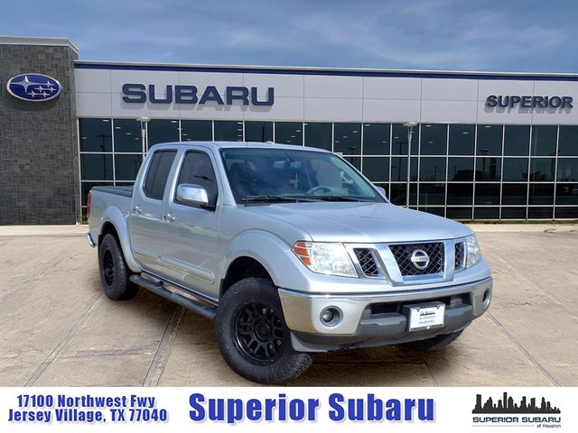 Brilliant Silver 2014 Nissan Frontier SL Crew Cab Pickup Truck 4X2 5-Speed Automatic Overdrive