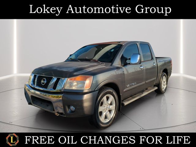 Silver (Smoke Metallic) 2010 Nissan Titan LE Crew Cab Pickup Truck 4X2 5-Speed Automatic