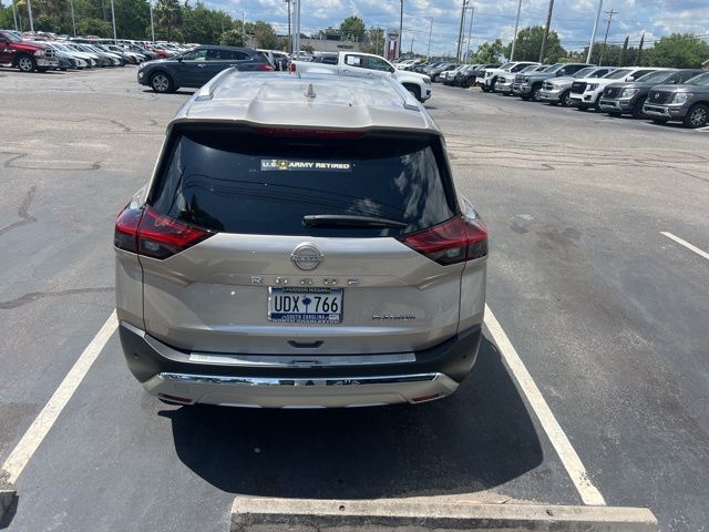 2023 Champagne Silver Metallic Nissan Rogue Platinum FWD SUV