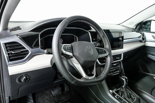 used 2025 Volkswagen Taos car, priced at $27,895