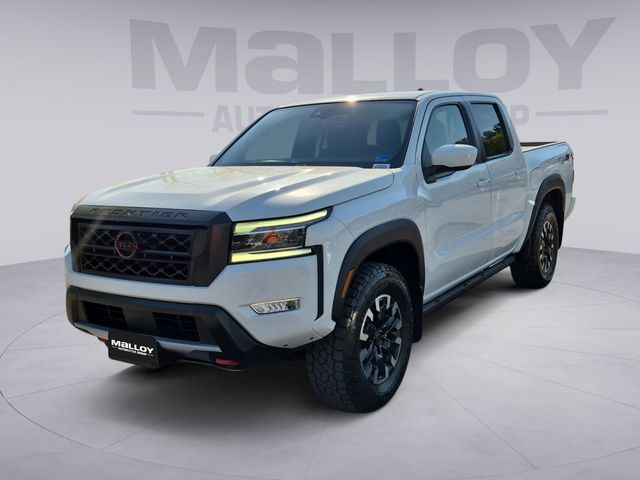 Glacier White 2023 Nissan Frontier PRO-4X Crew Cab 4WD Pickup Truck Four-Wheel Drive 9-Speed Automatic
