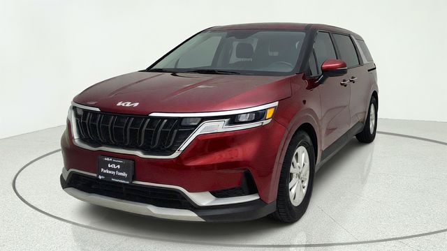 2024 Kia Carnival LX Red at DeMontrond Automotive Group