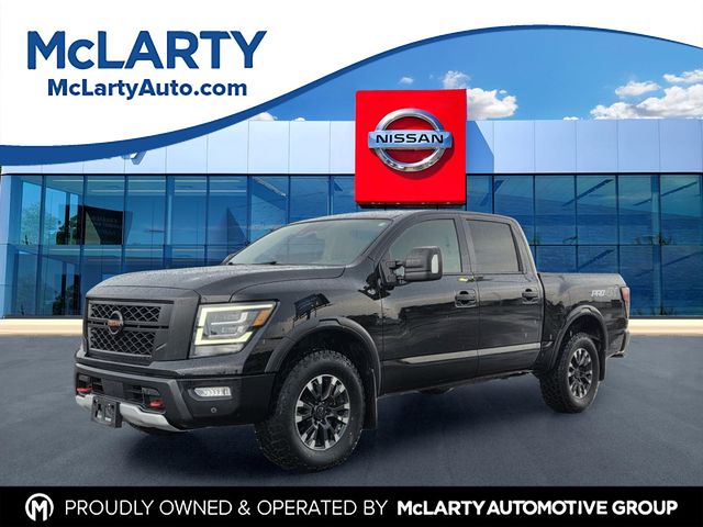 Super Black 2022 Nissan Titan Pickup Truck Four-Wheel Drive 9-Speed Automatic