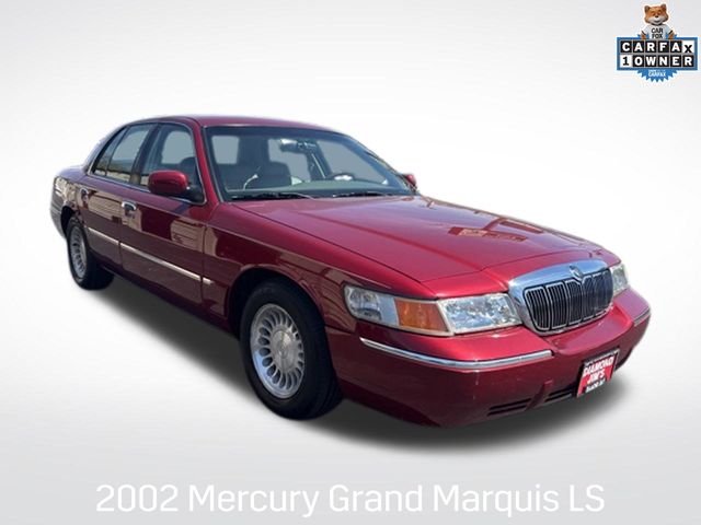 Red 2002 Mercury Grand Marquis Sedan  4-Speed Automatic Overdrive