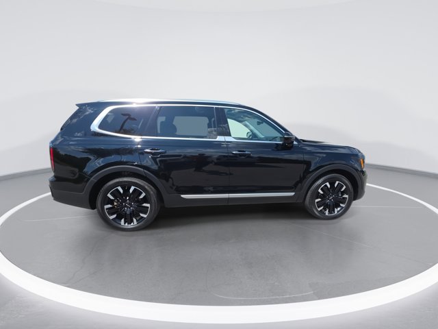 Used 2024 Ebony Black Kia SX-Prestige image 9