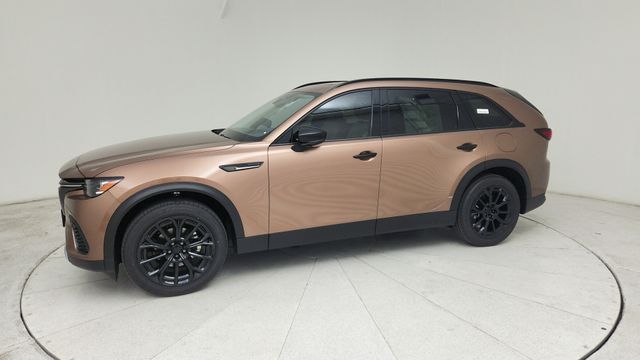 New Melting Copper Metallic 2026 Mazda 3.3 Turbo Premium AWD for