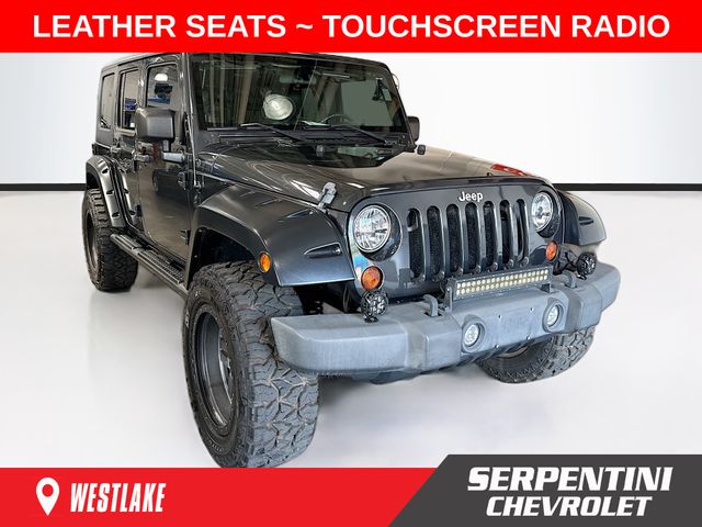 Black (Dark Charcoal Pearlcoat) 2010 Jeep Wrangler Unlimited Sport 4WD SUV / Crossover Four-Wheel Drive 4-Speed Automatic