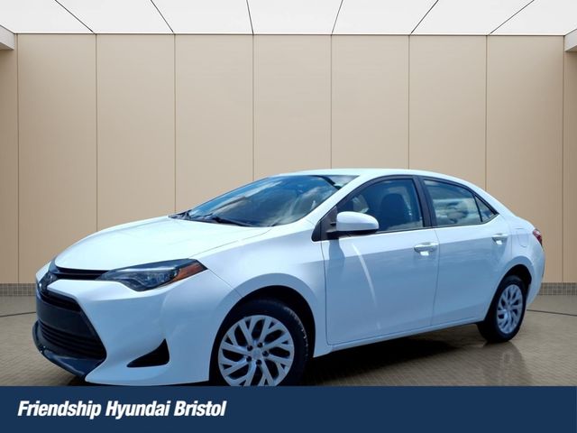 Super White 2019 Toyota Corolla LE Sedan Front-Wheel Drive Continuously Variable Transmission