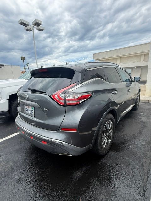 Used 2016 Gun Metallic Nissan SV image 6