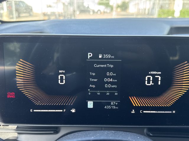 2025 Kia Carnival LXS Red at Shottenkirk Kia Fort Bend