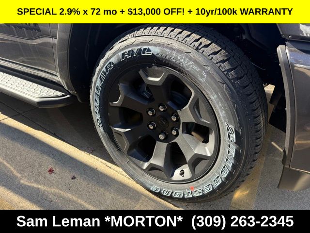 View vehicle photo 3