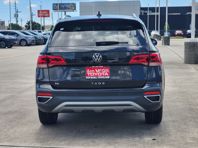 2023 Volkswagen Taos 1.5T SE Black at DeMontrond Auto Country
