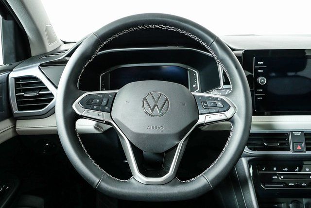 used 2025 Volkswagen Taos car, priced at $27,895