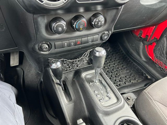 Used 2014 Red Jeep Unlimited Sahara image 24