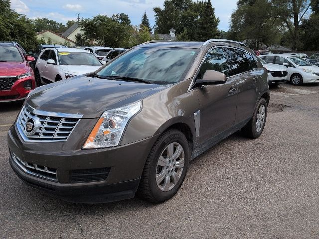 Used 2014 Cadillac SRX Luxury Collection with VIN 3GYFNEE3XES678339 for sale in Livonia, MI