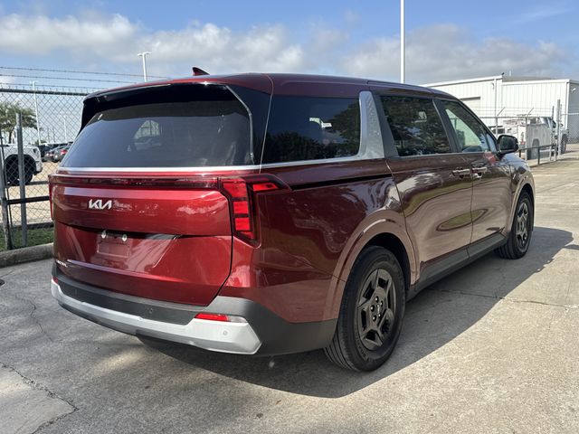 2025 Kia Carnival LXS Red at Shottenkirk Kia Fort Bend