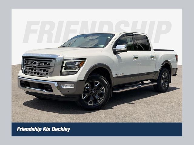 Pearl White Metallic 2023 Nissan Titan Pickup Truck Four-Wheel Drive 9-Speed Automatic